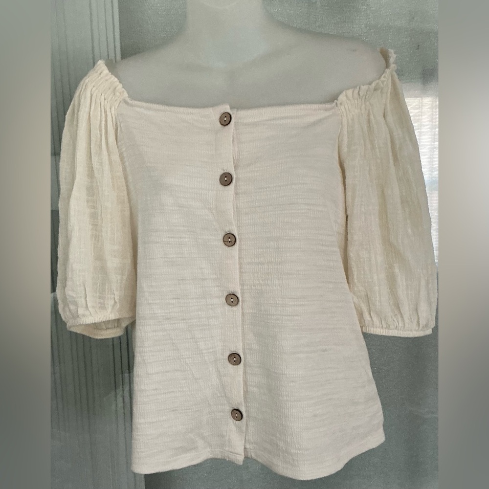 Cream puff-sleeve, button-front crop top